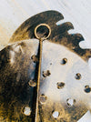 close up of metal fish hook at the back