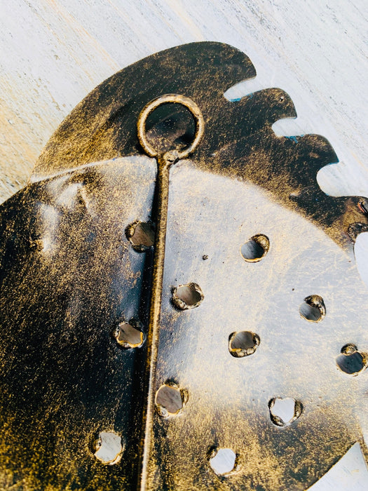 close up of metal fish hook at the back