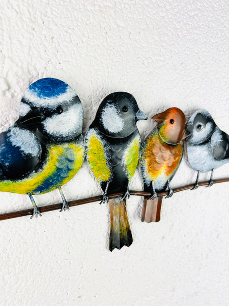 close up of metal garden birds