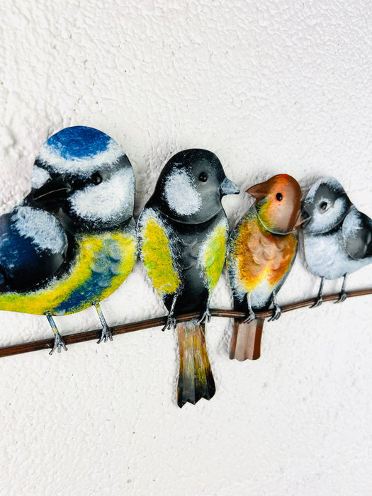 close up of metal garden birds