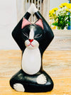 front view og wooden yoga kitty on wooden surface
