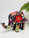 front view of black wooden flower elephant 