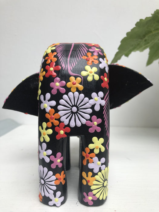 back view of wooden flower elephant