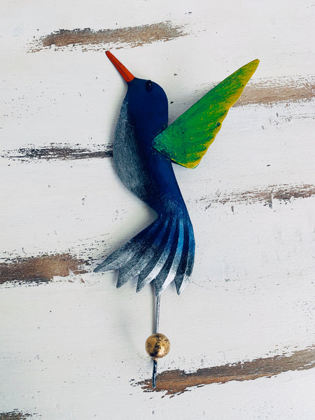 Handmade blue humming bird hook with multicolour detailing.