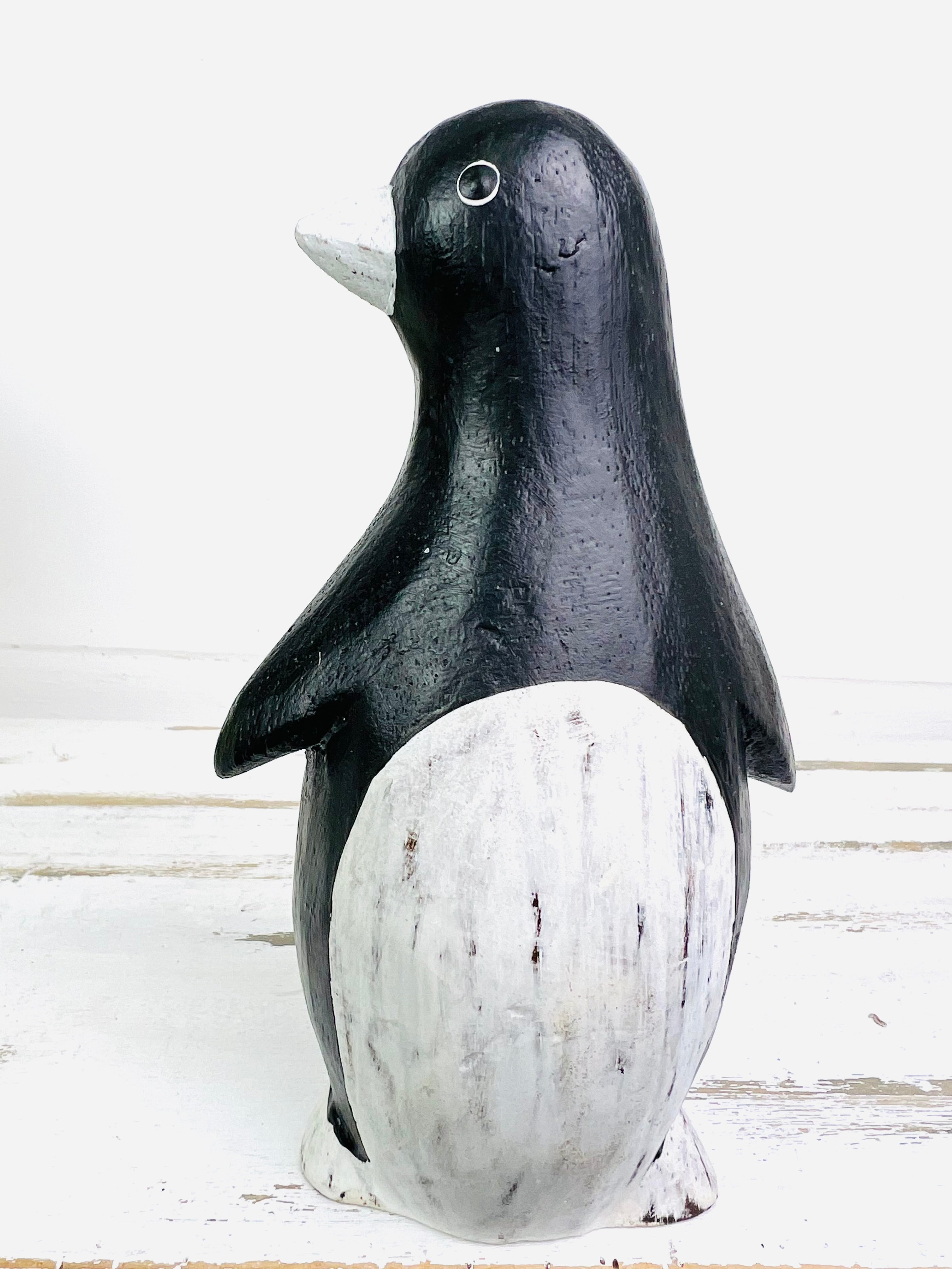 front view of wood penguin