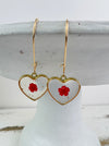 close up of pair of earrings