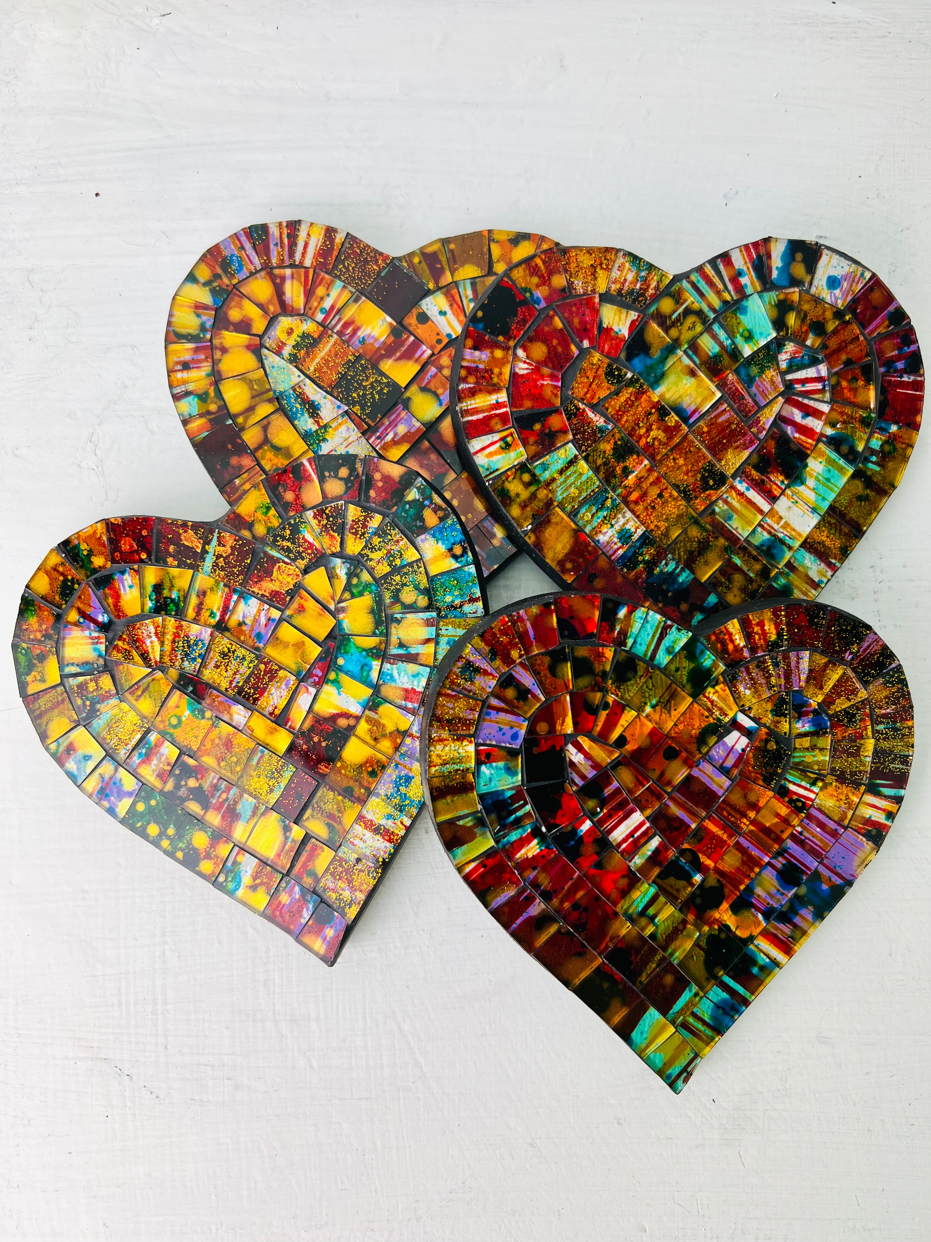 set of four mosaic heart shaped coasters