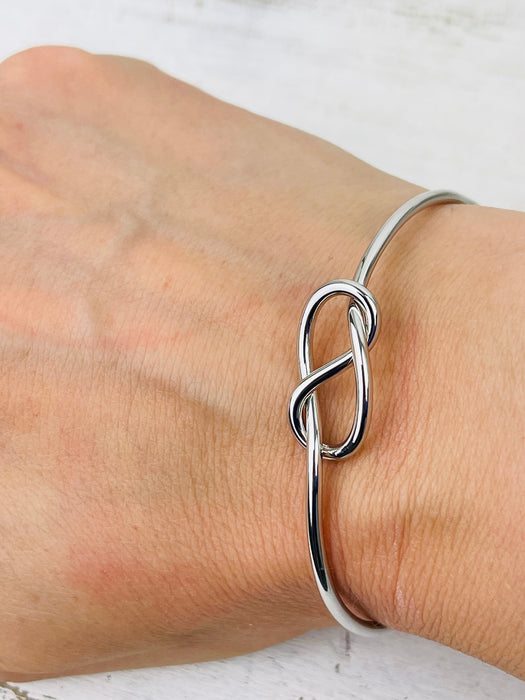 metal bracelet on hand