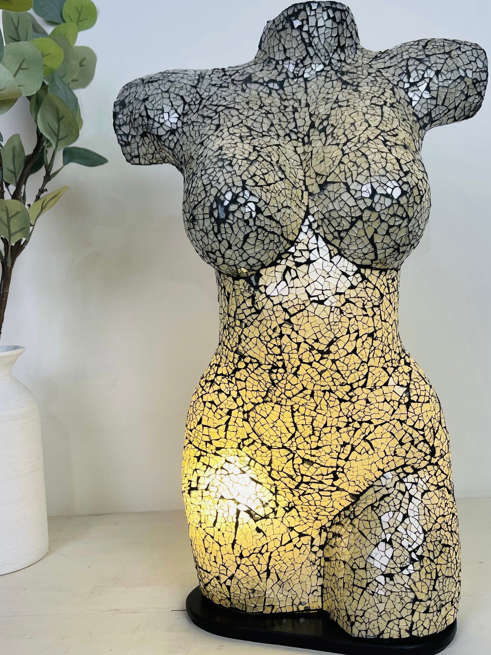 front view of mosaic bust lamp with light on