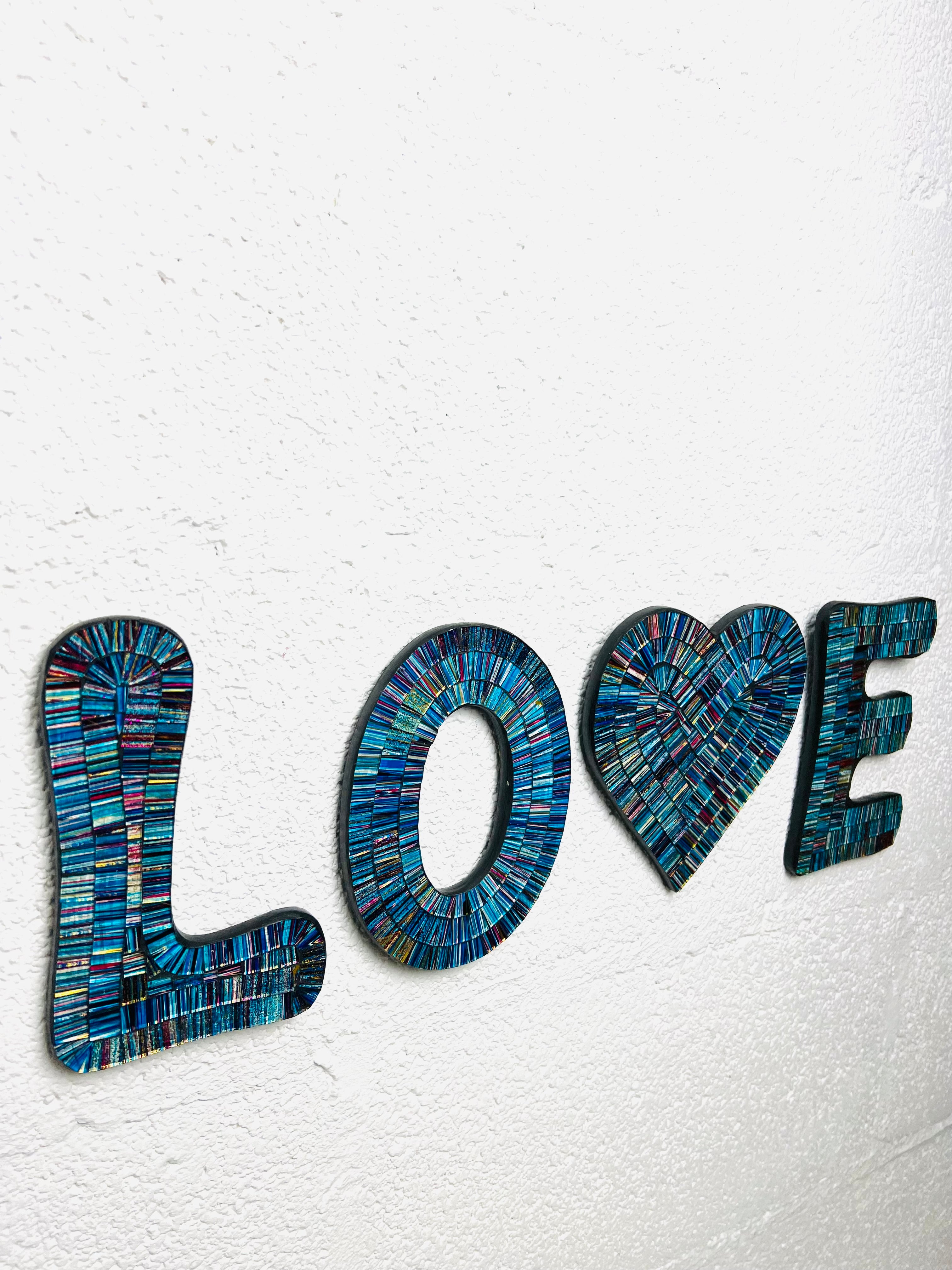 side view of love mosaic letters
