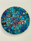 aerial view of mosaic round coaster in blue on white background