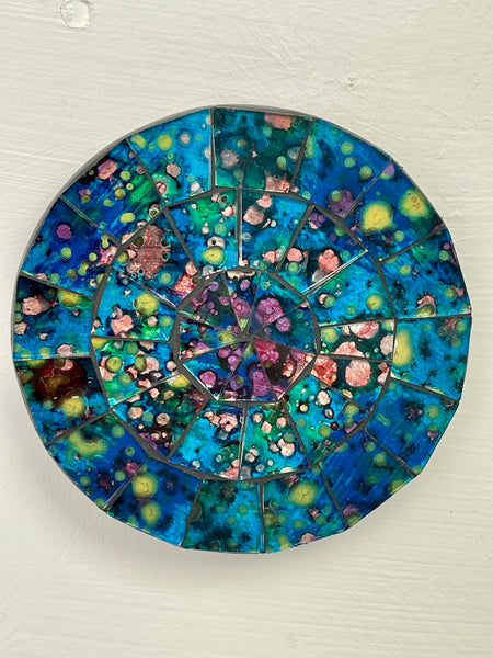 aerial view of mosaic round coaster in blue on white background