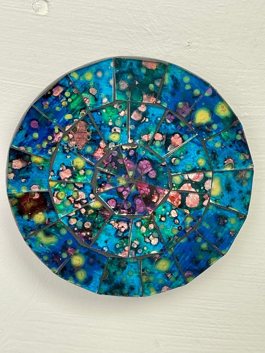 aerial view of mosaic round coaster in blue on white background