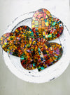 aerial view of mosaic heart coasters as a set