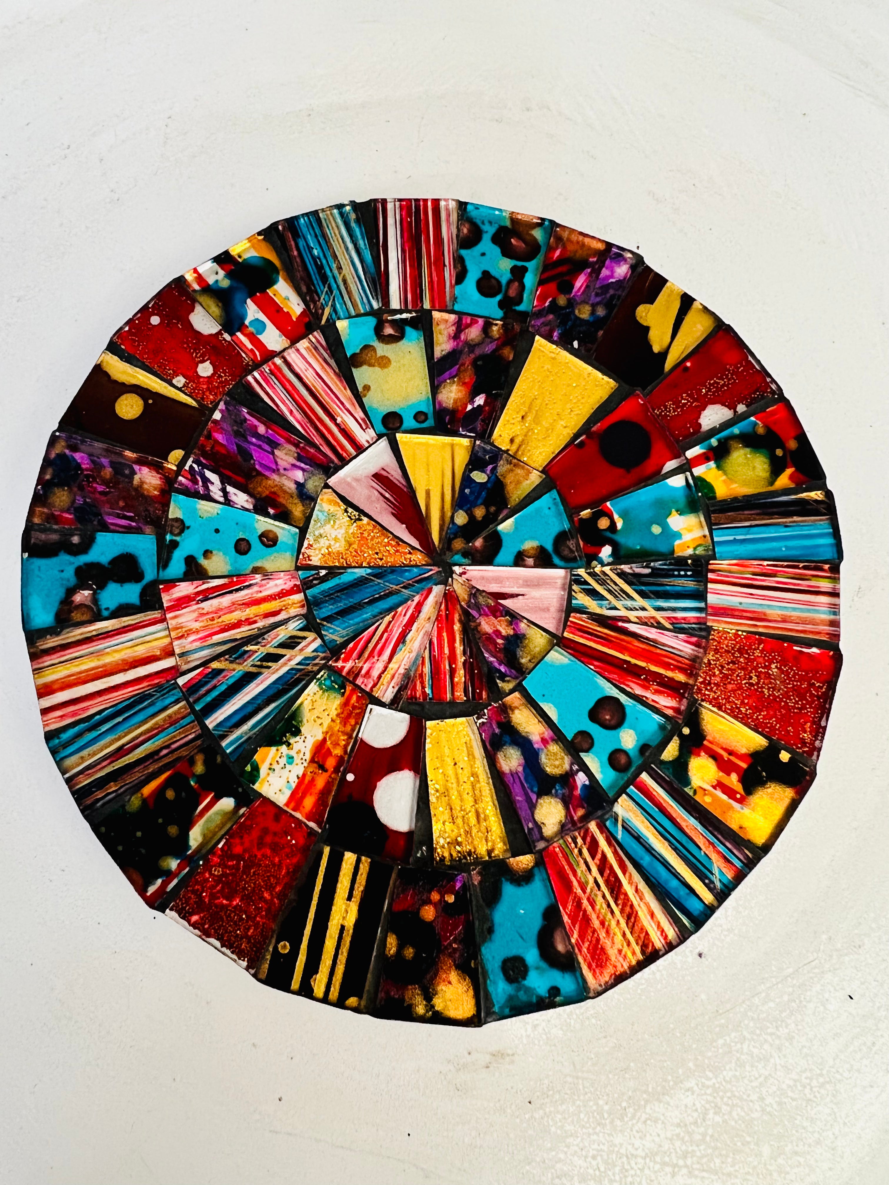close up of mosaic coaster in multi-colours