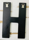 aerial base view of letter H from mosaic home wall art