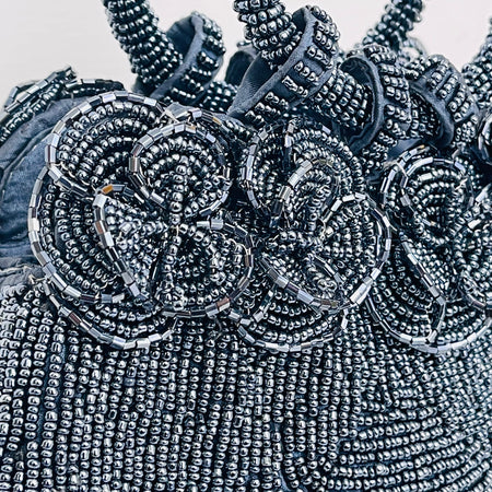 close up of beaded flowers of handbag