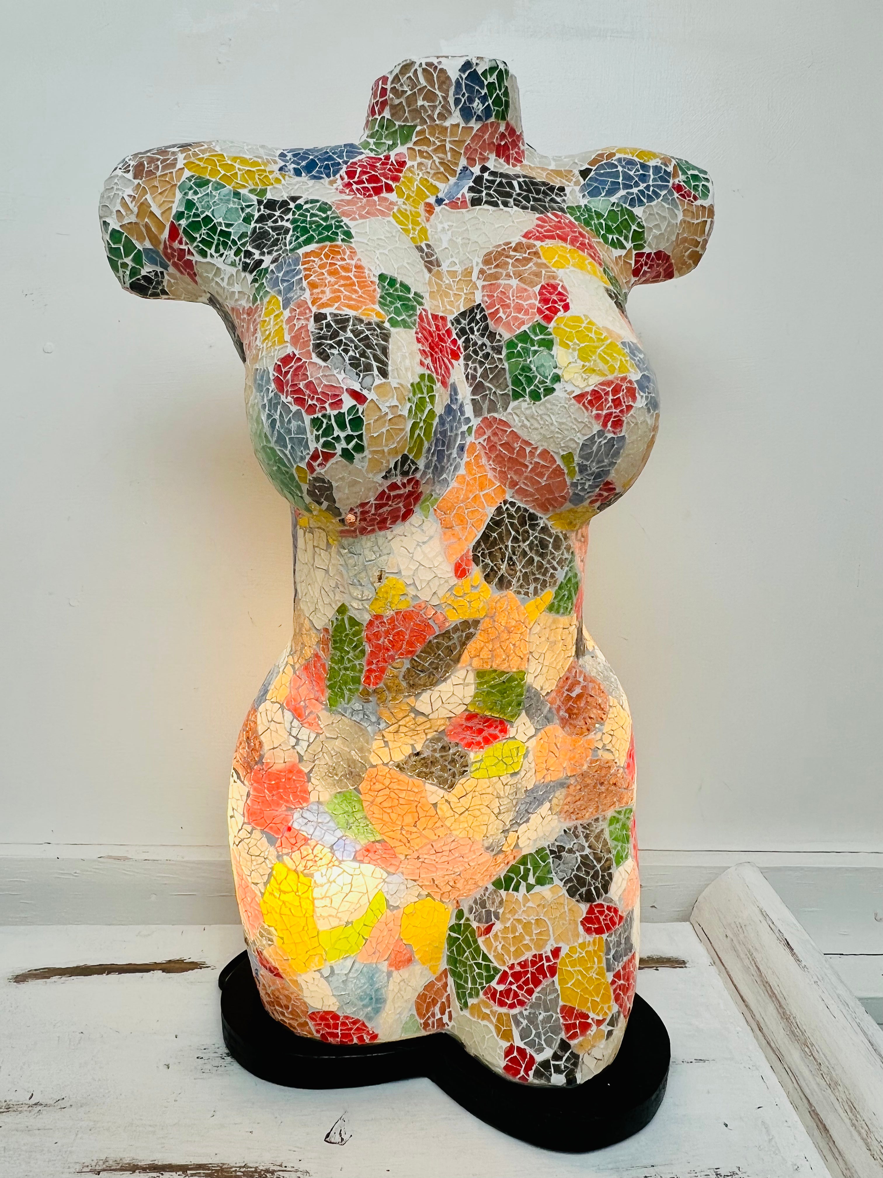 front view of mosaic bust lamp with light on