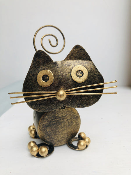 front view close up of metal tubby kitty