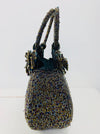 side view of beaded handbag 
