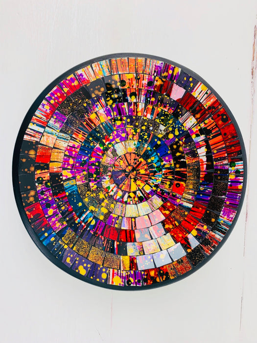 Top view of handmade mosaic glass bowl in Broadway design, featuring vibrant red, gold, blue and white glass mosaic pieces.