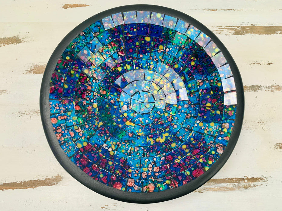 Top view of handmade mosaic glass bowl in Reef tones showing circular pattern of turquoise, violet and ocean blue glass tiles.