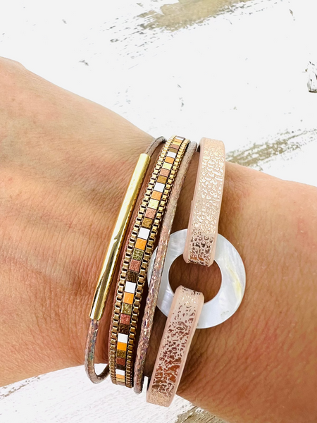 Multi strand bracelet with magnetic closure.