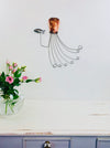 Large hand-painted copper metal octopus wall decoration with long curled tentacles
