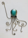 Hand-painted green metal octopus wall decoration with curled tentacles