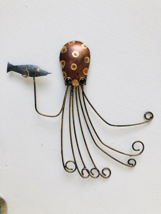 Hand-painted copper metal octopus wall decoration with curled tentacles and small decorative fish