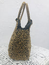 side view of gold beaded handbag