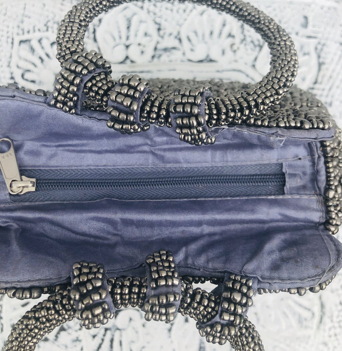 aerial view of beaded handbags opening