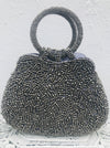 front view of beaded silver handbag