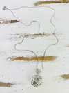 flat lay of necklace