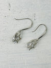 flat-lay of earrings