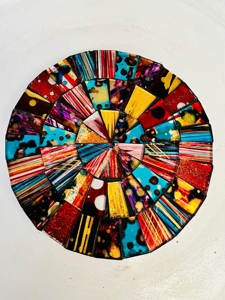 close up of mosaic coaster in multi-colours