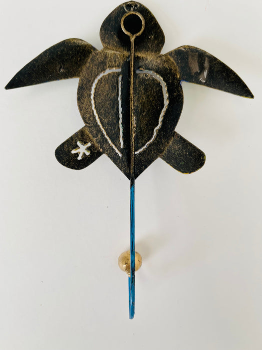 Back view of handmade turtle metal wall hook.