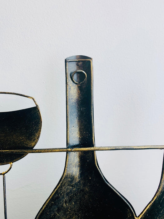 close up of hook for metal vino sign