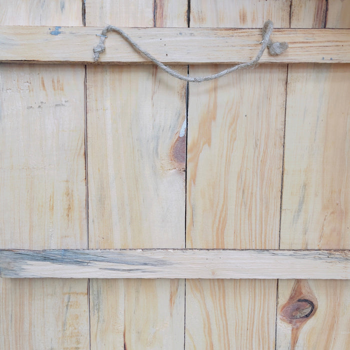 back view of the sign with rope attached