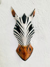 front view of zebra wood mask